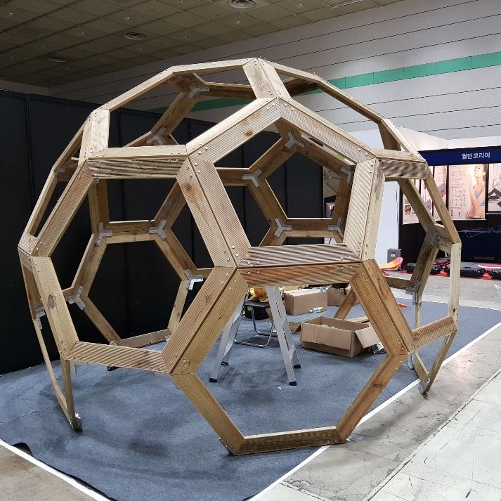 The meme is a picture of a large, empty, wooden framework resembling a giant, hollow, geodesic dome. The text "I'm not lazy, I'm just on energy-saving mode" appears at the top of the image, implying that the speaker is conserving energy by not doing anything. The image is humorous because it's a clever, tongue-in-cheek way to describe being idle or procrastinating.
